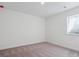 Bright bedroom with a window and neutral carpet, offering a blank canvas at 4729 Twelve Oaks Way, Castle Rock, CO 80104