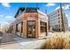 Corner commercial building with large windows and brick exterior, perfect for retail or dining at 2311 Decatur St, Denver, CO 80211