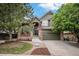 Charming two-story home with landscaped yard and covered porch at 11681 Night Heron Dr, Parker, CO 80134