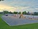 Outdoor playground with colorful equipment, surrounded by grassy areas and mature trees, perfect for Gathering fun at 11681 Night Heron Dr, Parker, CO 80134