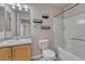 Bathroom featuring a single sink vanity and a shower-tub combination at 12833 Mayfair Way # F, Englewood, CO 80112