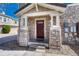 Inviting front entrance with stone accents and a stylish front door at 12833 Mayfair Way # F, Englewood, CO 80112