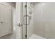 Walk-in shower with glass enclosure and modern fixtures at 998 Eaton St, Lakewood, CO 80214