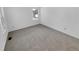Bright bedroom features a neutral carpet, large window, and ample natural light at 2639 S Xanadu Way # B, Aurora, CO 80014