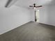Spacious bedroom with neutral carpet, closet and freshly painted white walls at 2639 S Xanadu Way # B, Aurora, CO 80014