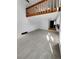 Large living room with tall ceilings that flows into a well-equipped kitchen at 2639 S Xanadu Way # B, Aurora, CO 80014