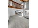 Bright, open living area with high ceilings and staircase access to the upper level at 2639 S Xanadu Way # B, Aurora, CO 80014