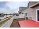 Backyard with a deck and white fence near lake at 15555 E 40Th Ave # 30, Denver, CO 80239