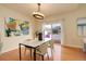 Elegant dining room featuring a modern table, stylish chairs, and natural light at 15555 E 40Th Ave # 30, Denver, CO 80239