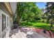 Beautiful backyard with a wooden deck, brickwork, and well-maintained lawn at 4505 S Yosemite St # 125, Denver, CO 80237