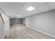 Finished basement featuring modern flooring and neutral colors at 4505 S Yosemite St # 125, Denver, CO 80237