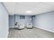 Spacious finished basement with light gray walls, light-colored floor, and ample seating at 4505 S Yosemite St # 125, Denver, CO 80237