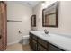 Stylish bathroom with dark wood vanity and modern fixtures at 4505 S Yosemite St # 125, Denver, CO 80237