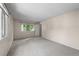 Neutral bedroom with large windows offering ample natural light at 4505 S Yosemite St # 125, Denver, CO 80237