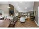 Inviting clubhouse living area with a stone fireplace, plush seating, and a well-equipped kitchen at 4505 S Yosemite St # 125, Denver, CO 80237