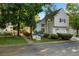 Inviting gray two-story home with charming landscaping and a well-maintained front yard at 4505 S Yosemite St # 125, Denver, CO 80237