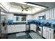 Well-lit kitchen features stainless appliances, a window over the sink, and attractive backsplash at 4505 S Yosemite St # 125, Denver, CO 80237