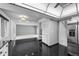 A stylish kitchen features sleek black tile flooring, stainless steel appliances, and plenty of cabinet storage at 4505 S Yosemite St # 125, Denver, CO 80237