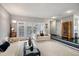 Bright living room with ample seating and access to outdoor space at 4505 S Yosemite St # 125, Denver, CO 80237