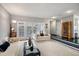 Living room with an interesting design and glass doors to the outside at 4505 S Yosemite St # 125, Denver, CO 80237