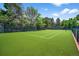 A well-maintained tennis court surrounded by lush greenery offers a perfect spot for sports enthusiasts at 4505 S Yosemite St # 125, Denver, CO 80237