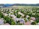 Neighborhood aerial view featuring large trees and easy access to the Rocky Mountains at 8410 S Oak St, Littleton, CO 80127