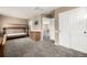 Spacious bedroom featuring a bunk bed, dresser, closet, and neutral paint scheme at 8410 S Oak St, Littleton, CO 80127
