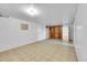 Spacious unfinished basement with built-in shelving and storage at 130 S Eaton St, Lakewood, CO 80226