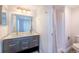 Bathroom featuring double sinks, updated vanity, and a shower with new fixtures at 5250 S Huron Way # 11-206, Littleton, CO 80120