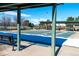 Community shuffleboard courts and shaded seating areas for residents to enjoy outdoor recreation at 5250 S Huron Way # 11-206, Littleton, CO 80120