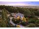 Luxury home on a large lot with a circular driveway and mountain views at 2198 Avenida Del Sol, Castle Rock, CO 80104