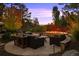 Outdoor patio with fire pit and seating area, perfect for entertaining at 2198 Avenida Del Sol, Castle Rock, CO 80104