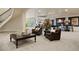 Finished basement with comfortable seating, a pool table, and a curved staircase at 2198 Avenida Del Sol, Castle Rock, CO 80104