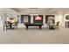 Spacious basement recreation area with a pool table and seating at 2198 Avenida Del Sol, Castle Rock, CO 80104