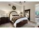 Spacious bedroom with a comfortable bed and plenty of natural light at 2198 Avenida Del Sol, Castle Rock, CO 80104