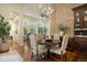 Bright breakfast nook features a round table and chairs, perfect for casual dining at 2198 Avenida Del Sol, Castle Rock, CO 80104