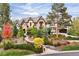 Stunning two-story home with manicured landscaping and stone accents at 2198 Avenida Del Sol, Castle Rock, CO 80104