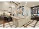 Gourmet kitchen with large island, custom cabinetry, and granite countertops at 2198 Avenida Del Sol, Castle Rock, CO 80104