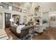 Bright and airy living room with high ceilings and a stunning chandelier at 2198 Avenida Del Sol, Castle Rock, CO 80104