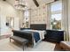 Main bedroom with ensuite bathroom and large windows with a view at 2198 Avenida Del Sol, Castle Rock, CO 80104