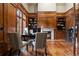 Spacious home office with built-in shelving and hardwood floors at 2198 Avenida Del Sol, Castle Rock, CO 80104