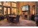 Outdoor kitchen and dining area on a covered patio at 2198 Avenida Del Sol, Castle Rock, CO 80104