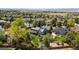 Spacious backyard featuring a large lawn and patio, captured from an aerial view showing neighborhood at 2187 Wynterbrook Dr, Highlands Ranch, CO 80126