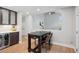 Bright dining area featuring a modern table and chairs next to the kitchen at 2187 Wynterbrook Dr, Highlands Ranch, CO 80126