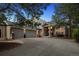 Charming home featuring a three-car garage, brick facade, and well-manicured landscaping at 2187 Wynterbrook Dr, Highlands Ranch, CO 80126