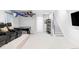 Spacious finished basement with theater seating, game tables, and ample room for recreation at 2435 S High St, Denver, CO 80210