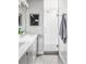 Modern bathroom boasts a sleek vanity, glass-enclosed shower, and contemporary fixtures for a spa-like experience at 2435 S High St, Denver, CO 80210