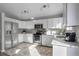 Sleek kitchen with stainless steel appliances and granite countertops at 5462 S Valdai Way, Aurora, CO 80015