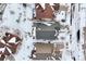 Aerial view of houses and street covered in snow at 23480 E Moraine Pl, Aurora, CO 80016