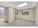 Finished basement bedroom with mirrored closet and carpet at 23480 E Moraine Pl, Aurora, CO 80016